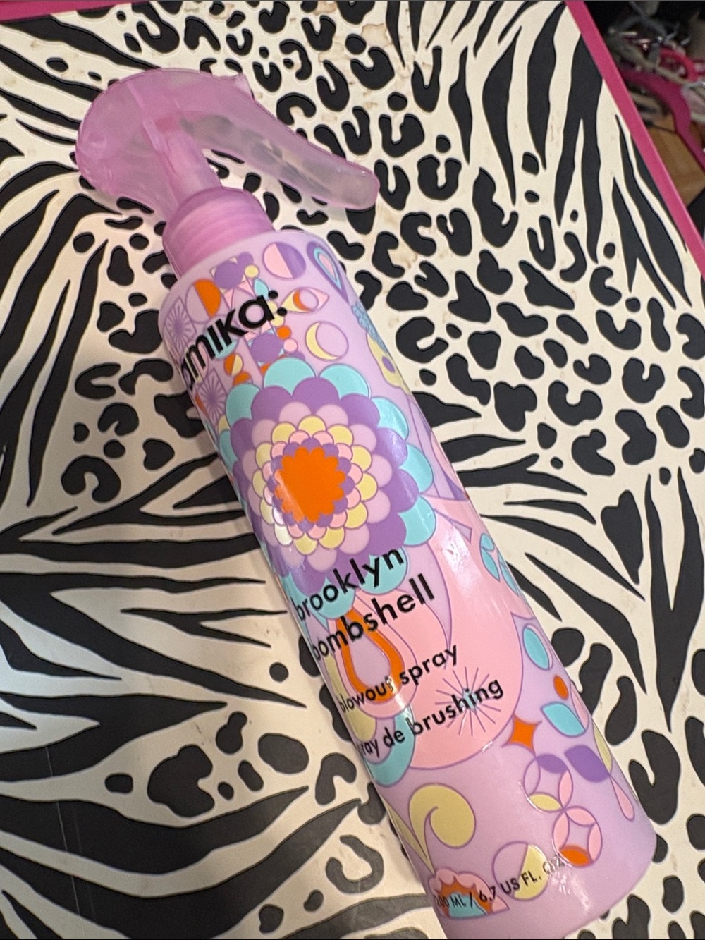amika Brooklyn Bombshell Blowout Spray — Pink with Multicolor Floral Design